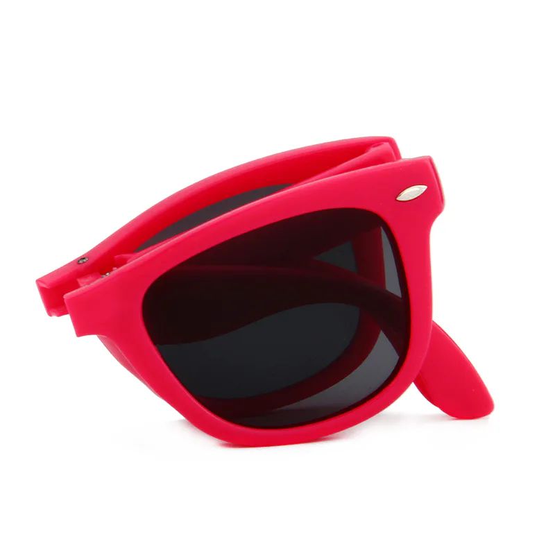Red DM-513 sunglasses folded into a compact shape
