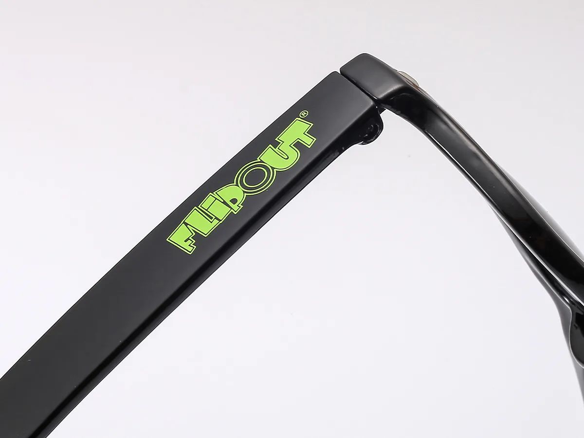 Screen printed green logo on a black sunglasses temple