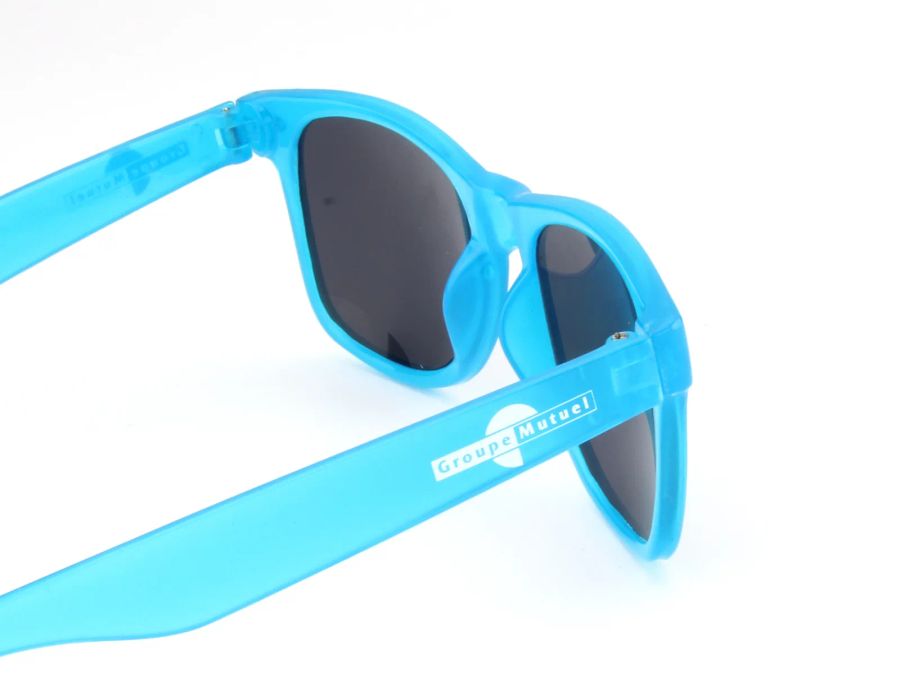 Temple logo area on blue glow-in-the-dark sunglasses DM-501