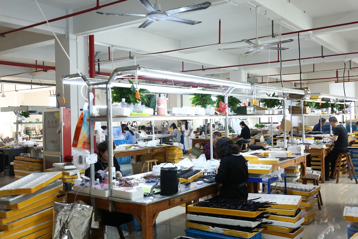 Assembly workshop inside the DOMI eyewear factory