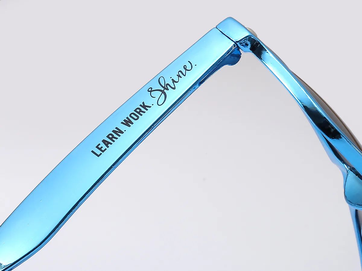 Pad printed black logo on a blue sunglasses temple