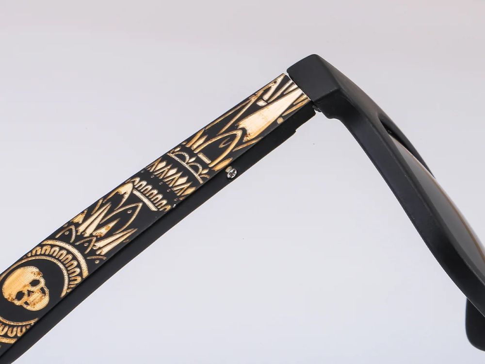 Laser-engraved graphic on a sunglasses temple