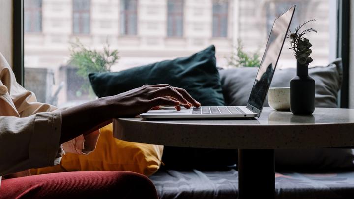 Person typing on a laptop