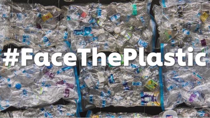 #FaceThePlastic written in front of plastics pile