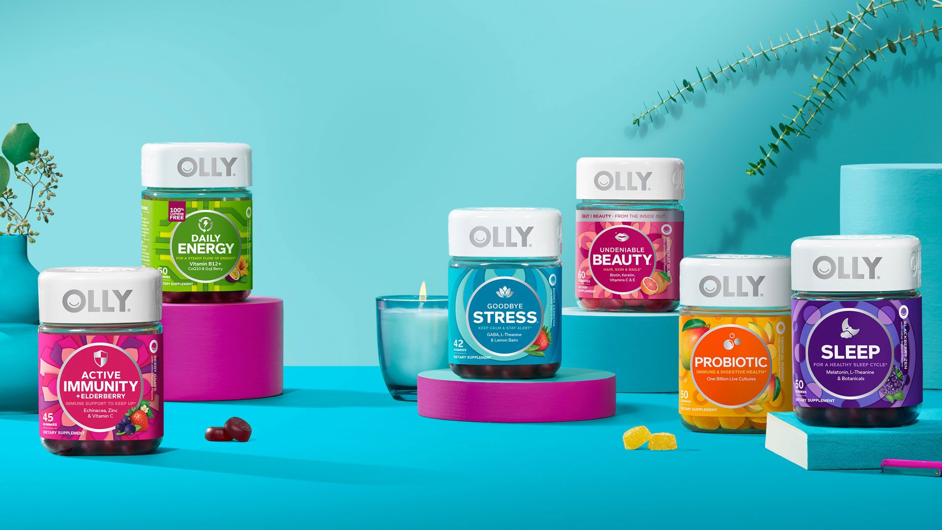 An assortment of OLLY Ultra Strength Softgels products in a colorful setting.