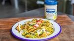 A jar of Hellmann’s Vegan Mayo stood behind a plate of risotto.