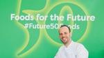 Michelin-starred chef Gregory Marchand sits in front of a green banner featuring the text Future 50 Foods