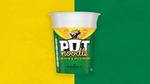 A Chicken & Mushroom paper Pot Noodle. On a green and yellow background.