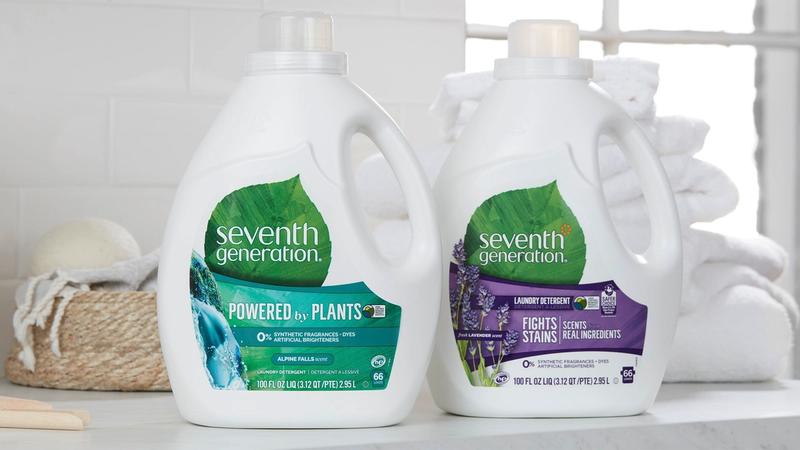 Two bottles of Seventh Generation laundry detergent on a kitchen counter
