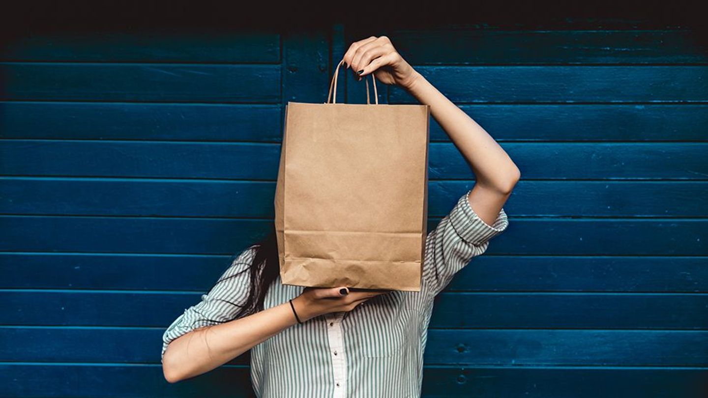 Woman with paper bag