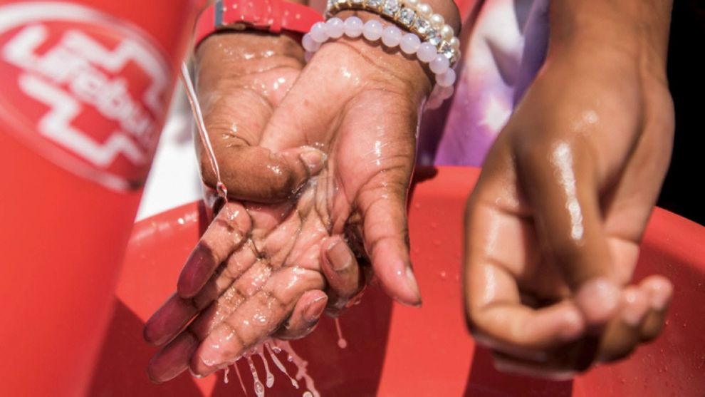 Children washing their hands