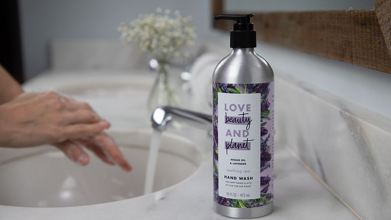 Love, Beauty and Planet bottle next to sink