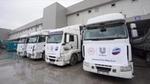 A row of Unilever trucks