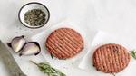 Two patties of The Vegetarian Butcher’s Raw Burger developed to have a similar texture and structure to meat