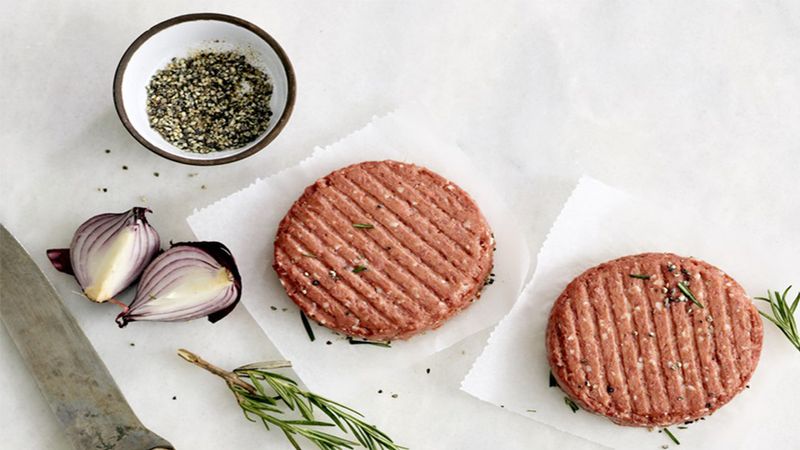 Two patties of The Vegetarian Butcher’s Raw Burger developed to have a similar texture and structure to meat