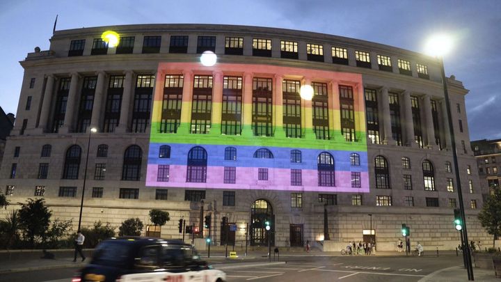 A Pride flag on the side of a building in London
