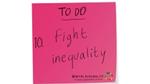 Pink stick note with Fight inequality written on it 