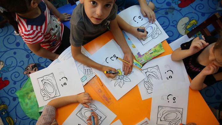 Children drawing and painting