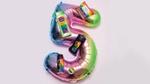 number 5 balloon in rainbow colours with Unilever Pride products