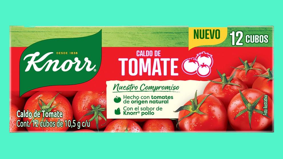 A box of Knorr tomato stock cubes on a green background.