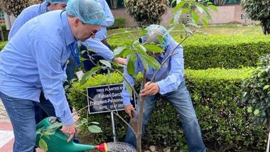 Fabian Garcia, President of Unilever Personal Care, plants a tree on a visit to the business in India