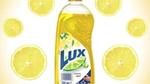 Bottle of Lux hand dishwashing liquid. The formulation is 99% biodegradable and uses 100% plant-derived ingredients.