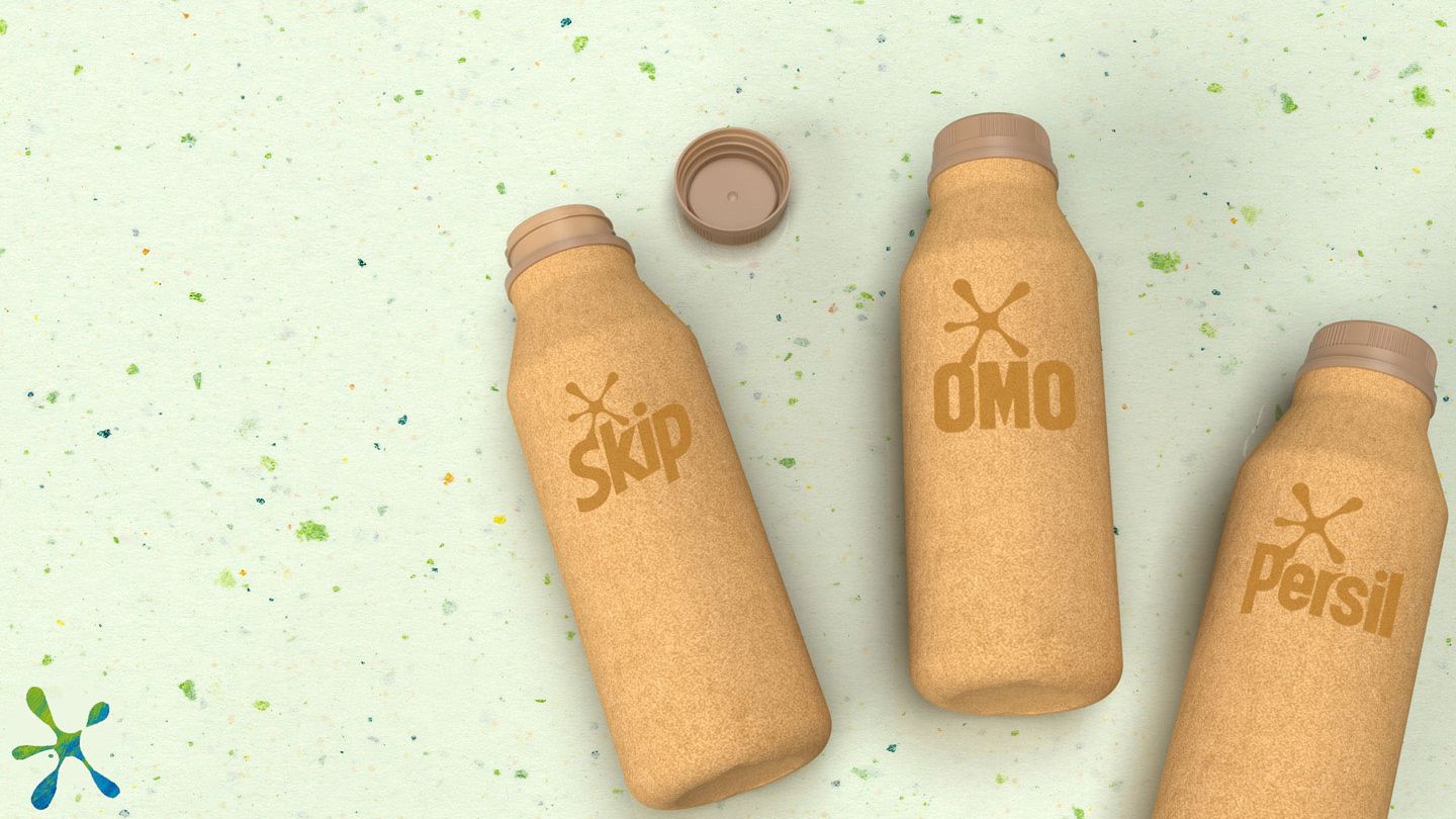Graphic rendering of new Pulpex paper-based bottles showing the Skip, OMO and Persil logos.
