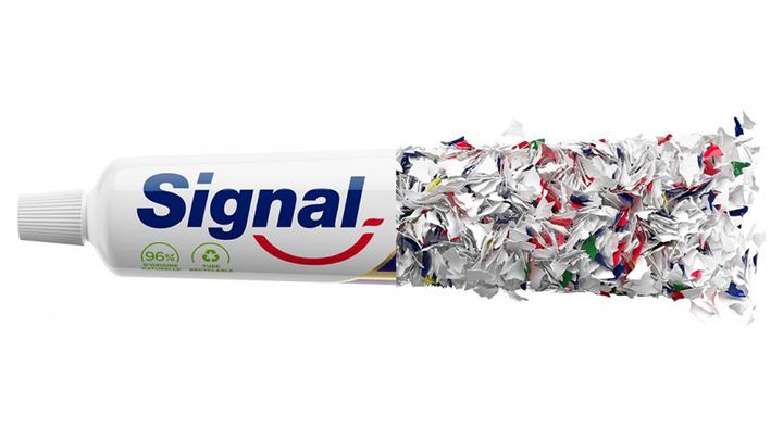 Signal toothpaste tube. The top half is normal. The bottom half is formed using recycled bits of plastic.