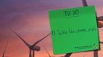 Banner with wind turbines image and then a green sticky note on the right-hand side