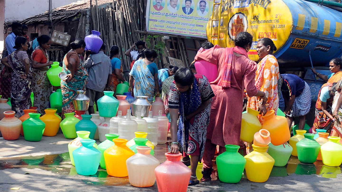 Ladies with water buckets
