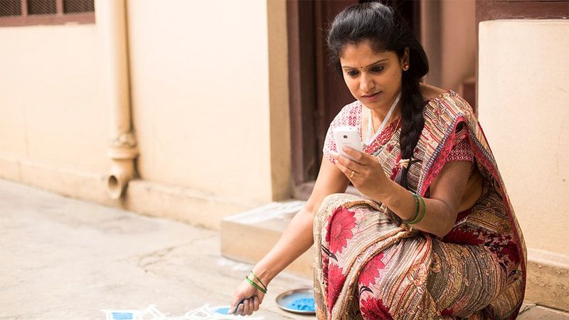 Indian woman with phone
