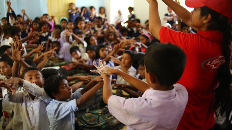 Lifebuoy campaigner teaches schoolchildren how to wash their hands properly 