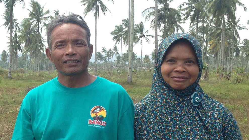 Two coconut smallholder farmers