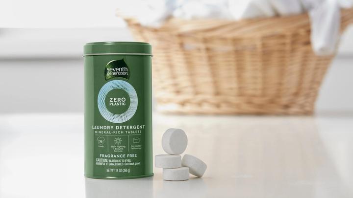 Seventh Generation’s fully biodegradable laundry detergent tablets next to the packaging canister that’s made from steel.