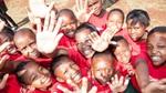 South African children giving high fives