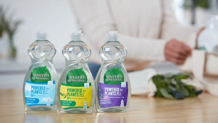 Bottles of Seventh Generation washing-up liquid lined up on a table