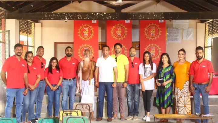 Officials from Unilever Sri Lanka, Mindshare, Wings Brand Activations and Swarnawahini along with leading celebrities of Sri Lanka, with Veddha Chief - Uruwarige Wannila Aththo, at the donation campaign in Dambana.  