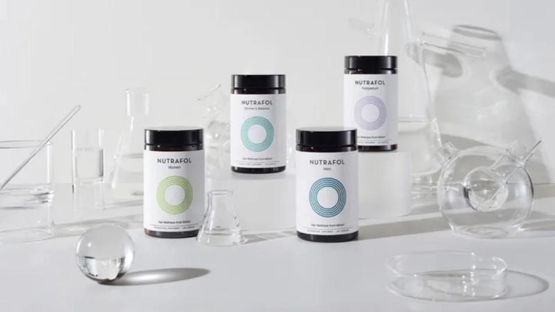 Four jars of Nutrafol, the No.1 dermatologist-recommended hair growth brand in the US.