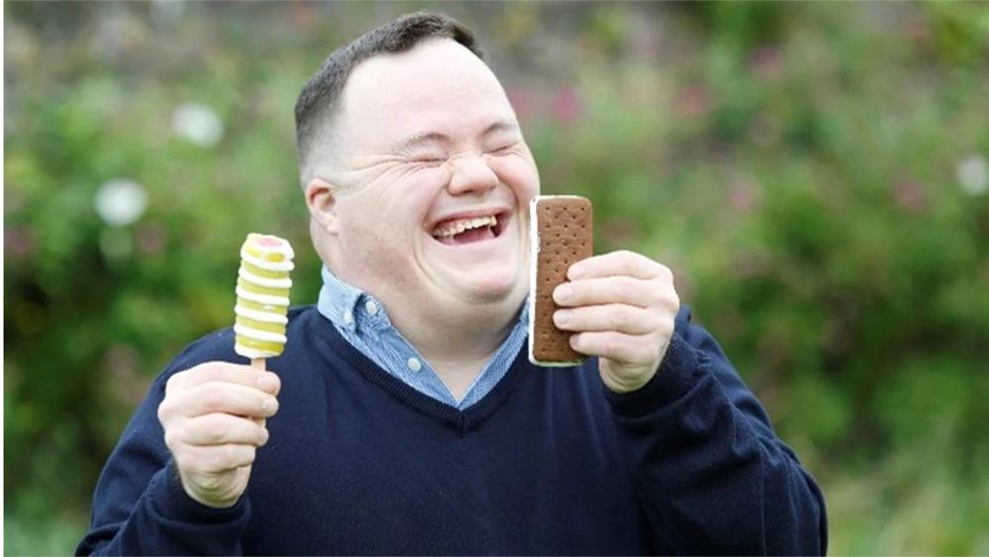 An individual enjoying their HB ice-creams, which help to support Down Syndrome Ireland