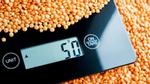 Digital kitchen scales and dried lentils