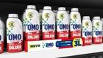 OMO Concentrate refill bottles on store shelf. The packs use 70% less plastic and are fully recyclable.