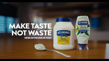 : A jar of Hellmann’s mayonnaise and a squeezy bottle of Hellmann’s Vegan Dressing & Spread. Text reads: Make taste not waste. We’re on the side of food.