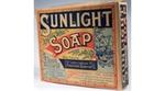 a vintage square bar of Sunlight soap in brown paper, branded packaging
