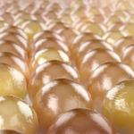 A close-up of the spheres that represent the lipids in our skin’s microbiome