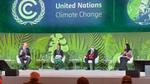 Unilever CEO Alan Jope sits far left on stage at the World Leaders Summit during COP26