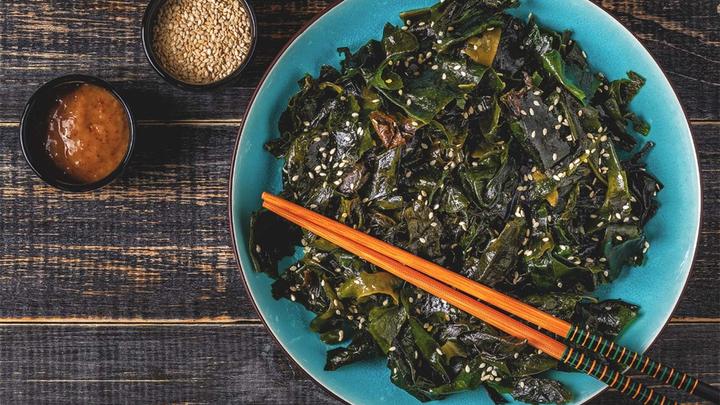 Bowl of food with chopsticks