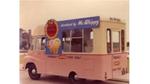pink and white Mr. Whippy ice cream van