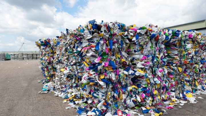 Veolia recycling facility showing a pile of mixed PET plastic ready to be recycled