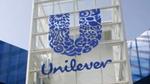 Unilever logo on the front of a glass building