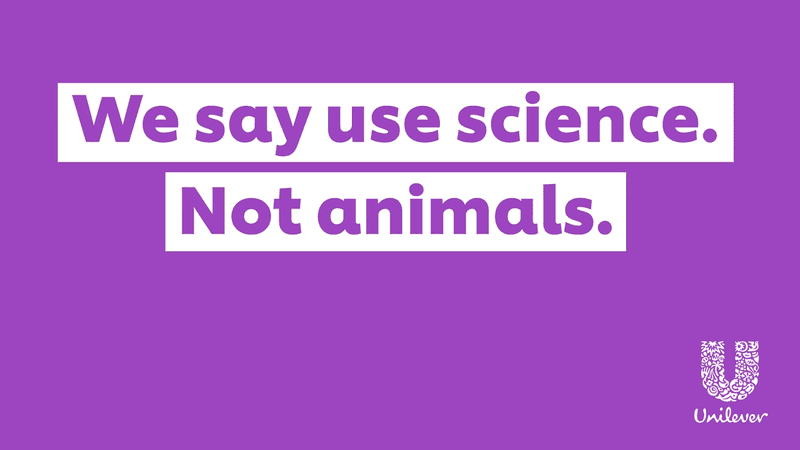 Purple poster with writing We say use science. Not animals 